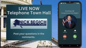 Image showing a phone and a graphic reading "Live now Telephone town hall"