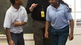 Theater director Andy Vaught leads students during a KIDsmART program.
