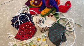 A collection of masks made by Sew-hio sewing club.