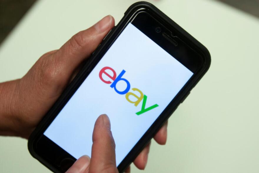An eBay app logo is shown on a mobile phone, July 11, 2019, in Miami. (Wilfredo Lee/AP)