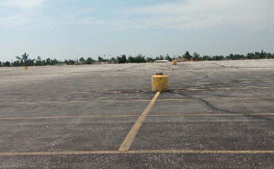 The parking lot is all that remains of the Dillion's Supermarket
