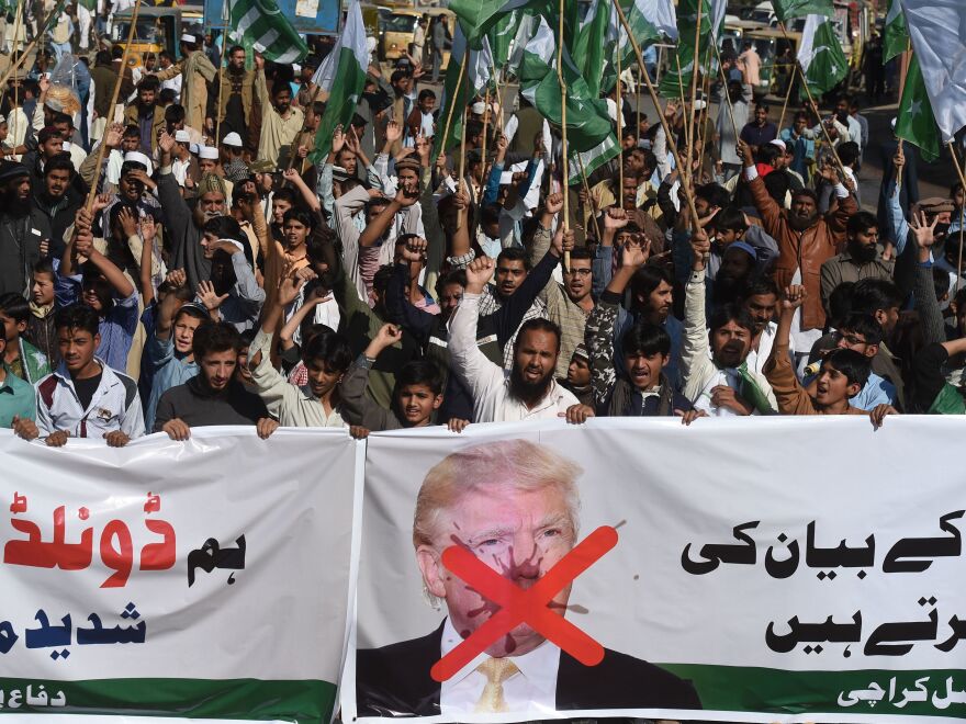 Activists of the Difa-e-Pakistan Council shout anti-U.S. slogans at a protest in Karachi on Jan. 2. Pakistan summoned the U.S. ambassador after President Trump lashed out at Islamabad with threats to cut aid over "lies" about militancy.