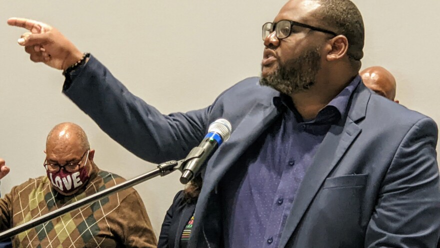 President of the NAACP Baton Rouge chapter, Eugene Collins, speaking at a press conference for organizations protesting proposed congressional and state legislative maps.