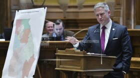 FILE - State Sen. John Kennedy, R-Macon, presents the newly-drawn congressional maps in the Senate Chambers during a special session at the Georgia State Capitol in Atlanta, Friday, Nov. 19, 2021. A federal judge ruled Thursday, Oct. 26, 2023, that some of Georgia's congressional, state Senate and state House districts were drawn in a racially discriminatory manner, ordering the state to draw an additional Black-majority congressional district. (Hyosub Shin/Atlanta Journal-Constitution via AP)