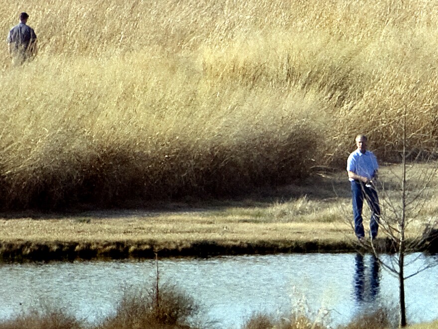 Former President George W. Bush fishes on a pond on his Crawford, Tex., ranch in 2008.