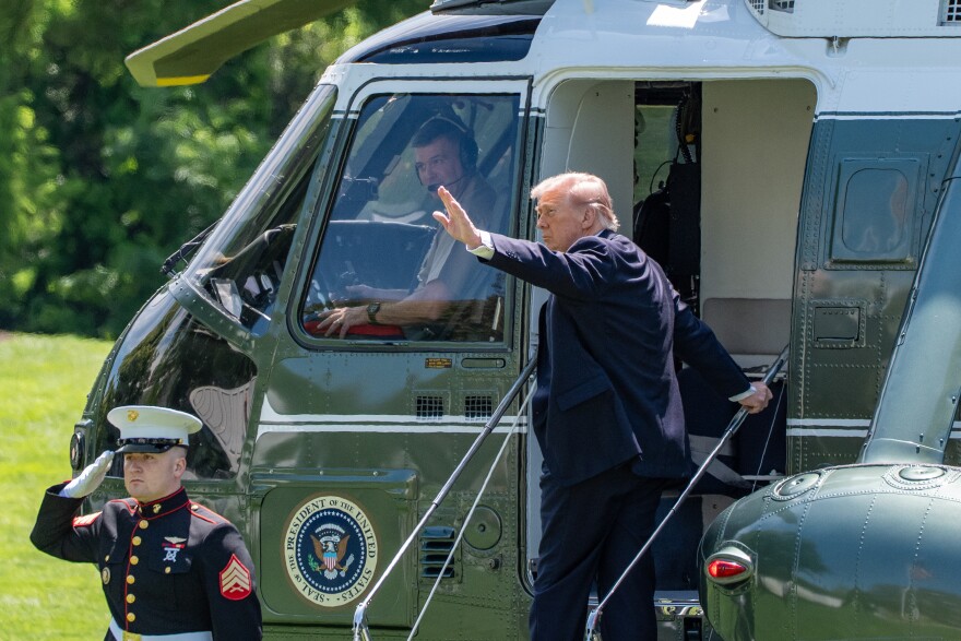 President Donald Trump waves before departing on Marine One from the South Lawn of the White House, Friday, May 1, 2026, in Washington.