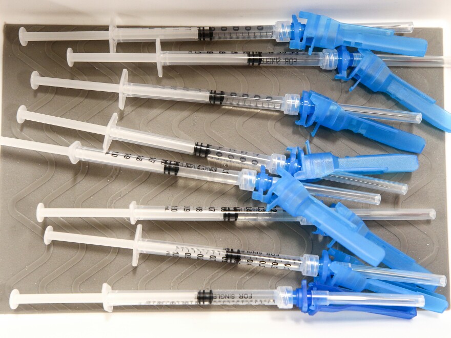 LOS ANGELES, CALIFORNIA - MARCH 11: Syringes containing a dose of the new one-shot Johnson & Johnson COVID-19 vaccine are viewed at a vaccination event at Baldwin Hills Crenshaw Plaza in South Los Angeles on March 11, 2021 in Los Angeles, California. The event was hosted by California health officials and FEMA. The Johnson & Johnson vaccine is now the third coronavirus vaccine to receive emergency approval for use in the United States. (Photo by Mario Tama/Getty Images)