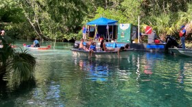  Boaters and the dredging machine