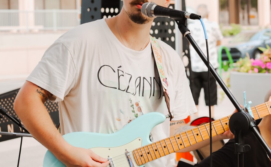 Man of the Flood's Quinn Heiking on guitar