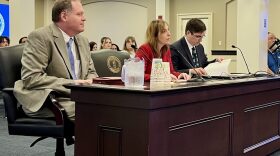 Kentucky Auditor Allison Ball, center, spoke to lawmakers on July 30. Ombudsman Jonathan Grate is at left and Alexander Magera, general counsel in the auditor’s office, is at right.