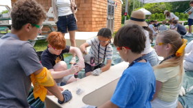 Students work on a project at an Alpha School summer camp in the Hamptons. Alpha School advertises 2-hour, daily learning blocks customized by AI followed by hands-on projects and life skills lessons. It's on track to open locations in Edmond and Tulsa this fall.