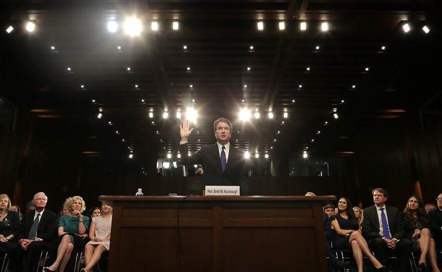 Brett Kavanaugh, seen getting sworn in before a confirmation hearing early last month.
