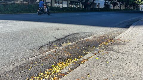 A pothole on the edge of Kapiʻolani Boulevard in Honolulu on Dec. 2, 2025.