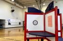 Polling locations, like this one at Shelby Traditional Academy in Louisville, are open from 6 a.m. to 6 p.m. local time for the May 17 primary.