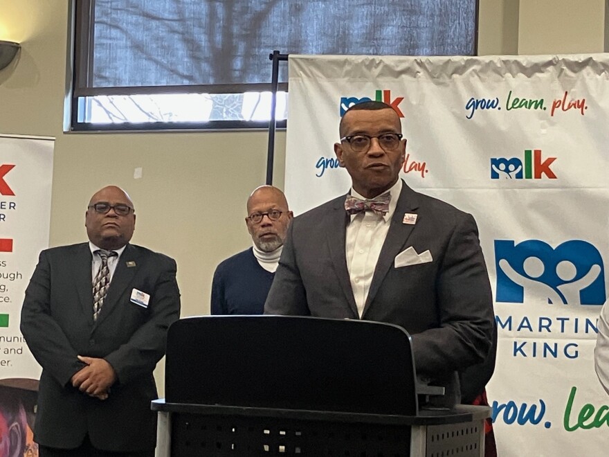 Rev. Dwight Ford, executive director of Project NOW, speaks at Thursday's press conference at the MLK Center, Rock Island.