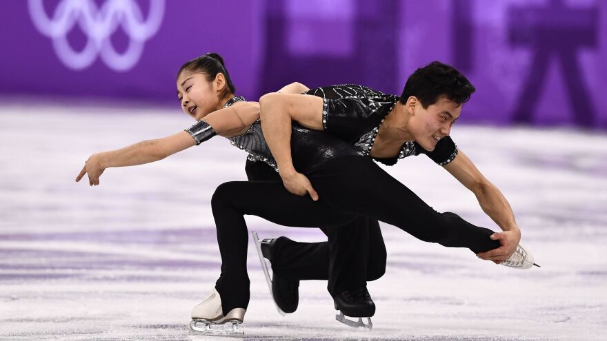 North Korea's Ryom Tae Ok (left) and Kim Ju Sik compete in the pair skating short program of the figure skating event during the Pyeongchang 2018 Winter Olympic Games at the Gangneung Ice Arena on Wednesday.