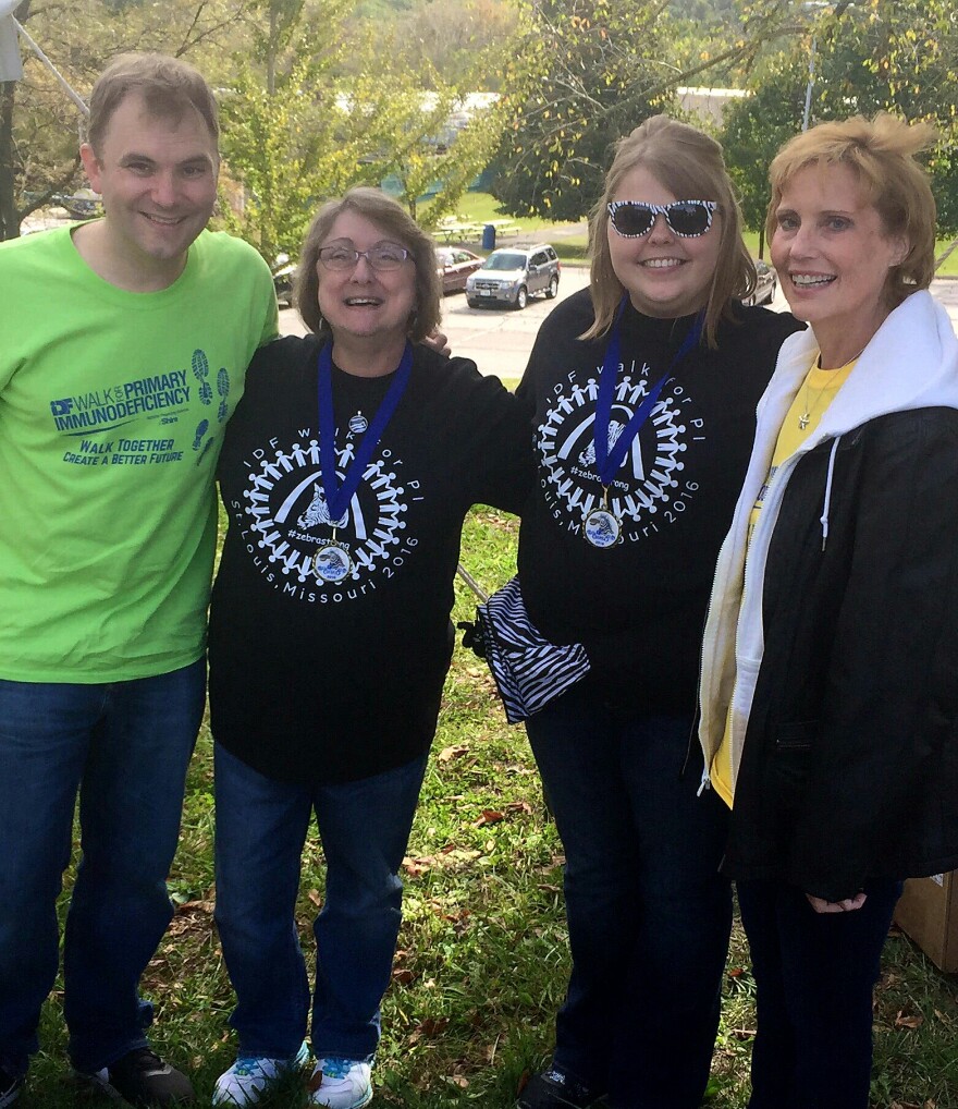 Karen Wheat, second from left, stands with fellow volunteers at the Immune Deficiency Foundation's Walk for PI (Primary Immunodeficiency Diseases) on 10/09/16.