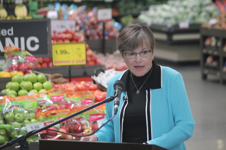 Governor Laura Kelly at a grocery store in Olathe.