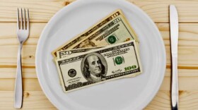 Money on a dinner plate.