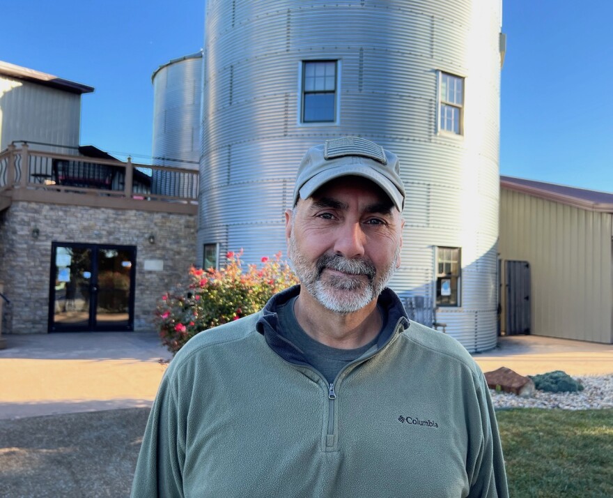 Stephen Bartels in front of his upscale repurposed grain silo accommodations