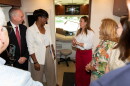 Dr. Shane Speights and Dr. Brookshield Laurent of NYIT College of Osteopathic Medicine at Arkansas State University provide Arkansas Governor Sarah Huckabee Sanders and Secretary of Health Renee Mallory with a tour of the medical school's "Delta Care-a-Van" mobile health unit during Sanders' Aug. 11 visit to the Jonesboro campus. On Thursday, Sanders awarded NYITCOM at A-State with a $1.5 million grant to be used for a maternal health initiative, and the med school will devote a portion of the grant funds to purchase a second mobile health unit to be used for maternal health care.