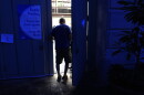 A person arrives to vote on the first day of early voting 