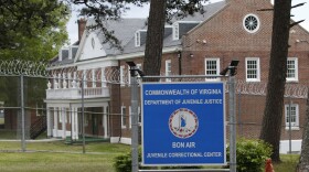 Security fences surround buildings at The Bon Air Juvenile Correctional Center on Tuesday April 21, 2020, in Bon Air, Va. 