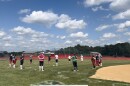 Pittston Area's softball team stretches before their last practice ahead of the state championship game on June 13.