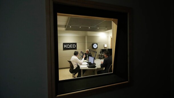 Radio host Scott Shafer, left, moderates a California gubernatorial debate between Republican candidate John Cox, center, and Democratic candidate Gavin Newsom at KQED Public Radio Studio in San Francisco, on Oct. 8, 2018. The NPR station is among many in California hit by Republican congressional cuts to the Corporation for Public Broadcasting.
