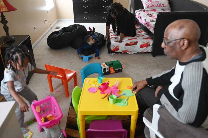Wilma Walker and her husband, Howard, enjoy playtime with their grandchildren. "With all of us in the same home, I feel like I'm the one that's kind of guarding everybody," Wilma says.