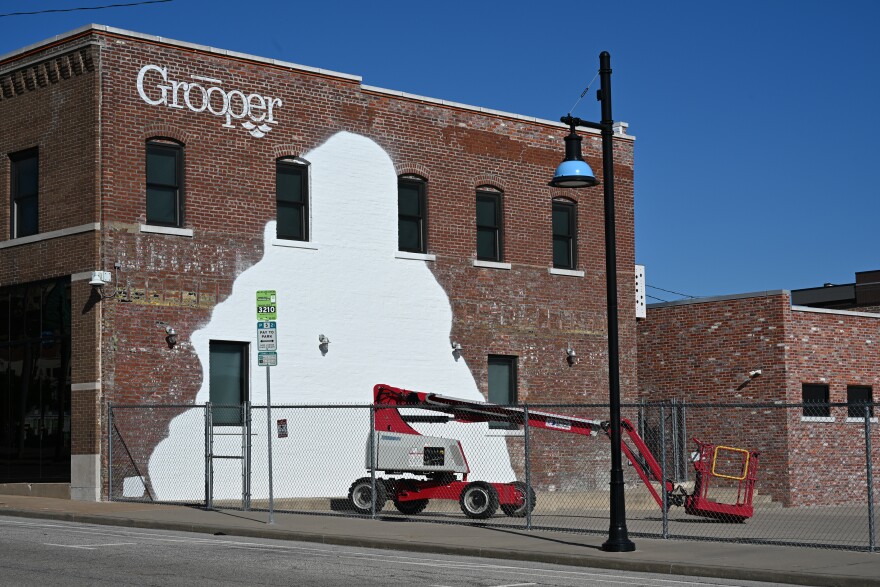 A mural in Tulsa covered with white paint is seen.