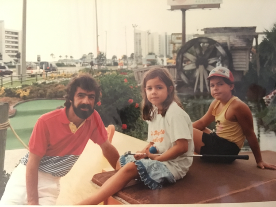 Dursan (middle) enjoying a day of mini-golf in Panama City during a family vacation in 1990.