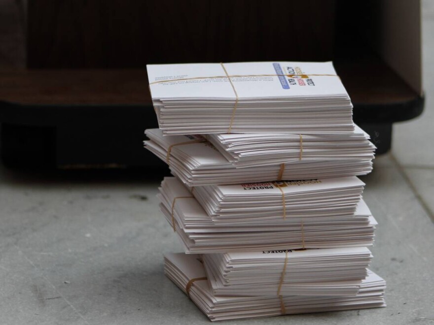 Demonstrators with Hoosier Action delivered hundreds of stories to Gov. Mike Braun to explain how important Medicaid is in the lives of everyday Hoosiers.