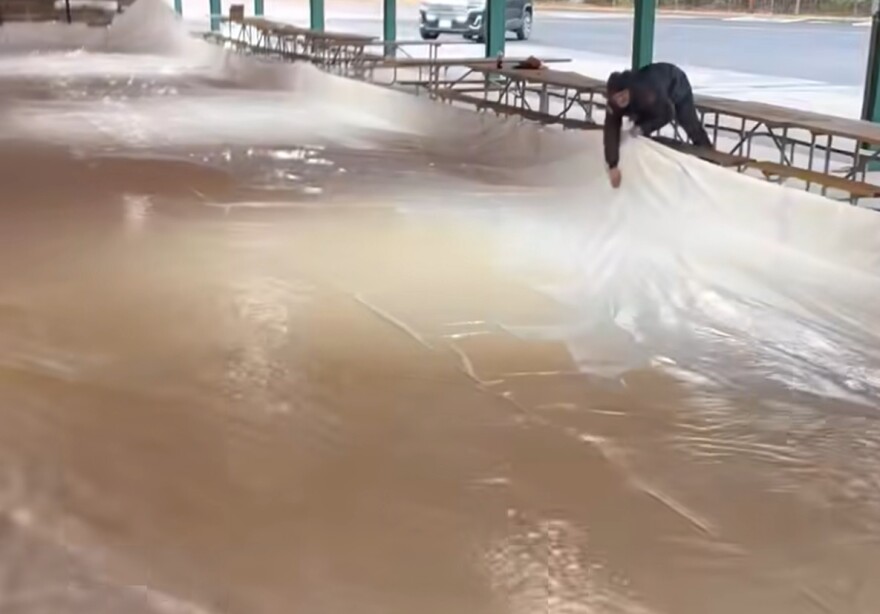 Area under the St. Germain pavilion being flooded to form an ice rink