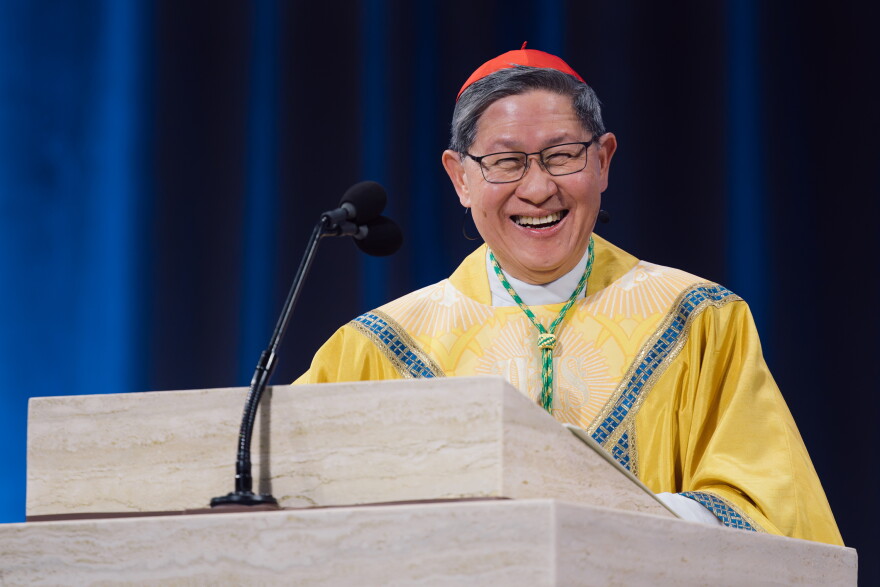 Cardinal Luis Antonio Tagle laughs while delivering his homily during the beatification Mass for the late Archbishop Fulton J. Sheen on Thursday at the Dome at America's Center in downtown St. Louis. Tagle drew laughter from the crowd while noting that Sheen and Pope Leo XIV were both born in Illinois.