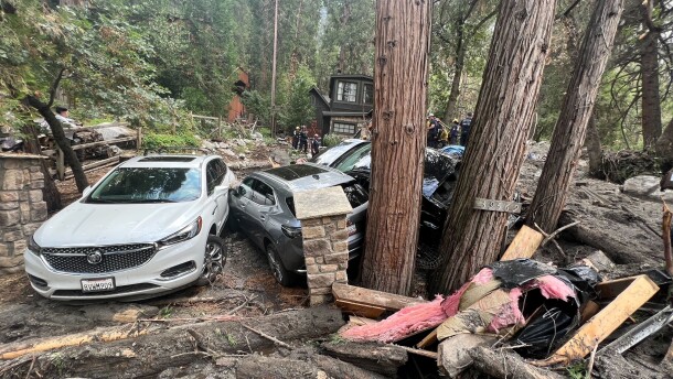 Photo of cars piled up in debris after the Sept. 12 mudslides that occred in Oak Glean and Forest Falls.