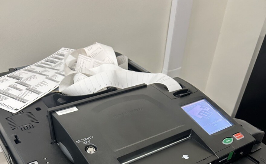 A vote tabulator with zero tape printed out during Saginaw's public accuracy test on Tuesday, Oct. 13, 2026. The tape signifies that no votes have been counted prior to the processing of ballots.