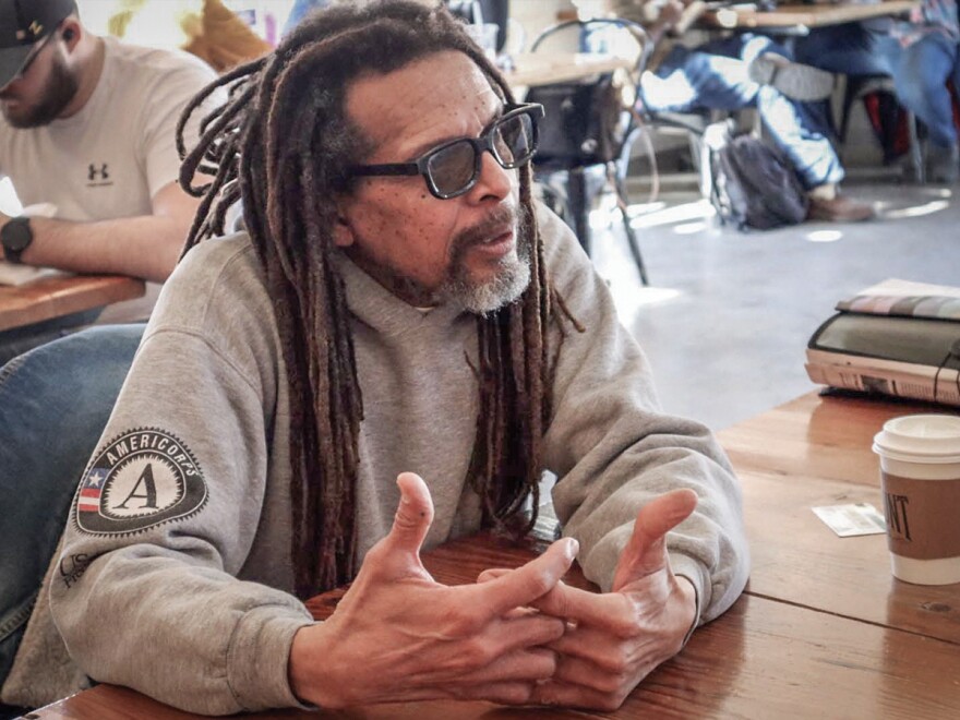 Darryl Carrington engages in discussion at Fairmount Coffee Company in February.