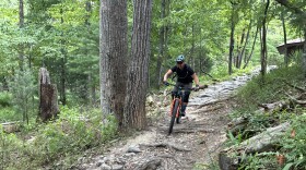 Roanoke mountain biker Mark Boyer drops down a trail at Carvins Cove Natural Reserve.