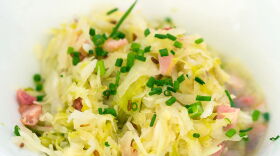 "Warmer Speckkrautsalat" is a Tyrolean cabbage and speck (Tyrolean cured ham) salad served warm. 