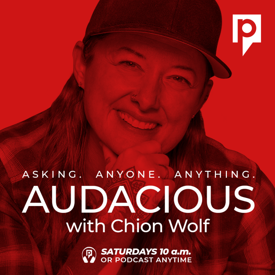 Host Chion Wolf against a red background with the words: Asking. Anyone. Anything. Audacious with Chion Wolf.  