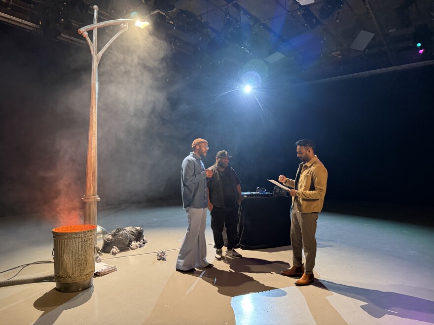 Al Martin (right) directs musical guests James Gardin and DJ Wise on the set of Streetlight Sessions in WKAR's studios.