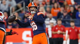 Syracuse quarterback Malachi Nelson (16, Blue) prepares to make a throw in SU’s loss to Louisville.