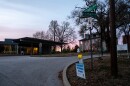 Signs in support a new KVC Missouri pediatric mental health hospital are scattered around the existing educational facility on Tuesday, Dec. 10, 2024, in Webster Groves.