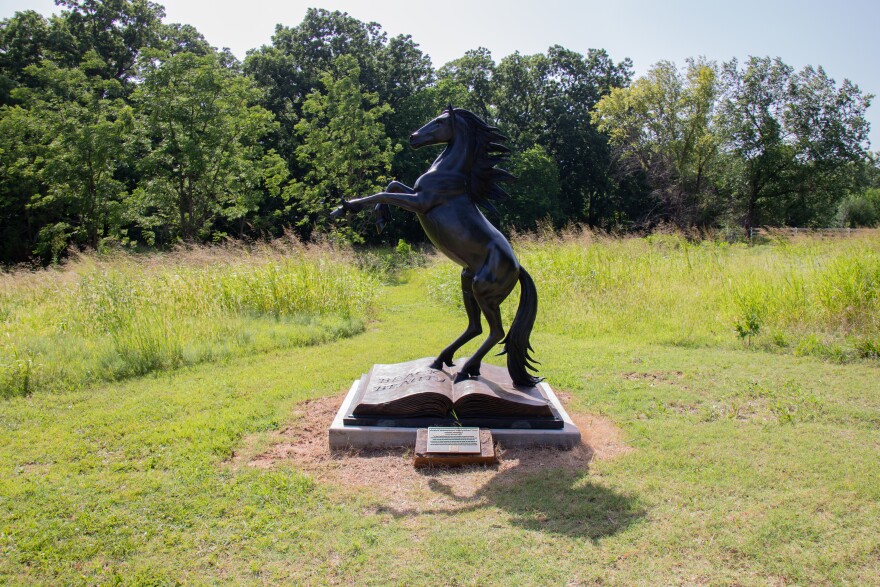 A statue of Anna Sewell's Black Beauty stands at the edge of the Botanic Garden.