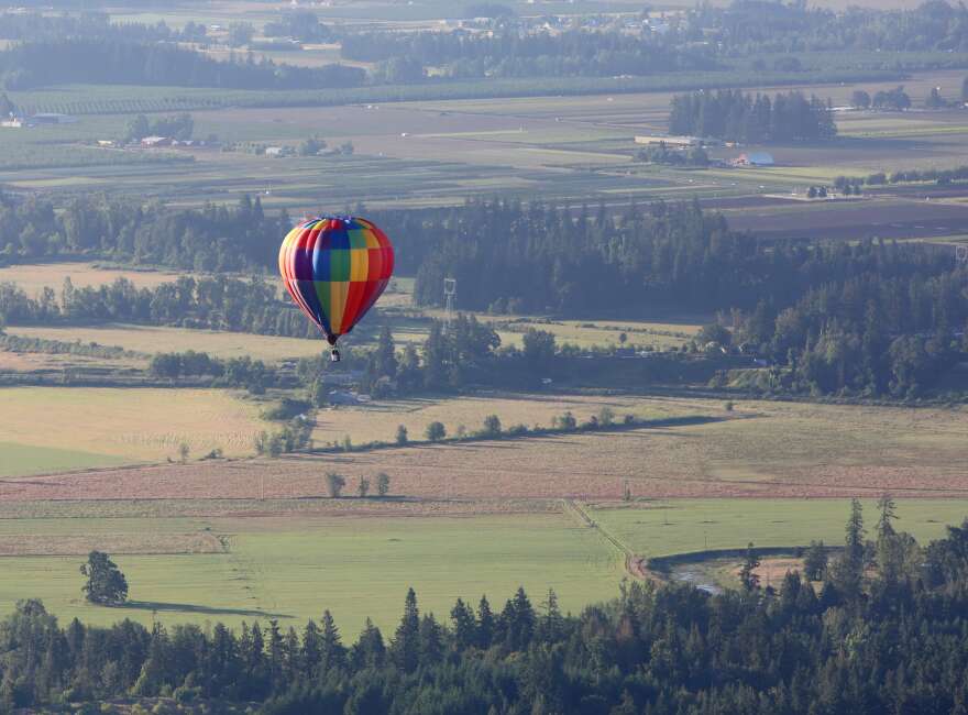 It&#39;s a hot weekend for outdoor activities such as ballooning. The La Jolla, piloted by Dale Justice of Newberg, prepares to touch down on the first morning of the 38th Annual Tigard Festival of Balloons on Friday, June 24, 2022. 