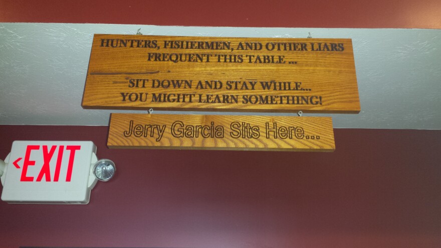 The sign above the Cedarville Liar's Table invites you to, "Sit down and stay awhile, you might learn something." 