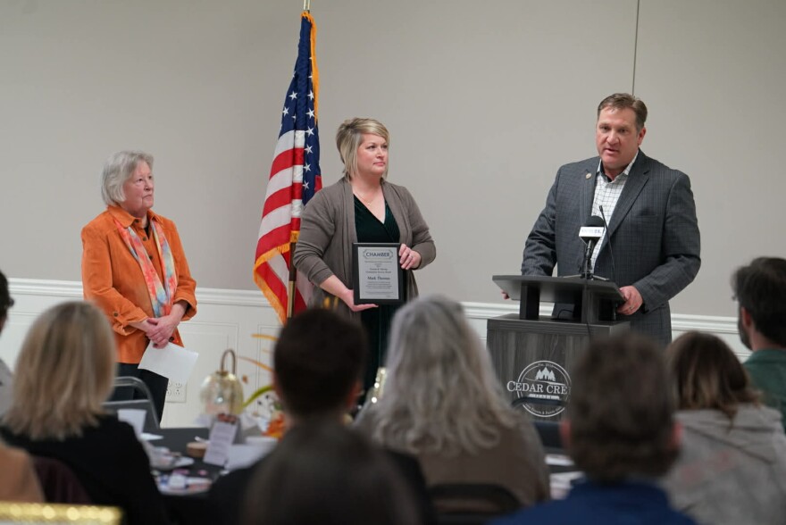 Mark Thomas receives the Thomas B. Herring Community Service Award at Cedar Creek Hall in Galesburg.