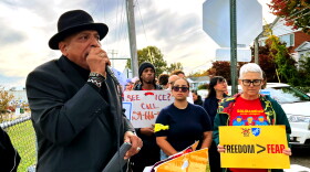 Rev. Scott Marks stands outside Tweed-New Haven Airport on the afternoon of October 21, 2026 with members of the New Haven Immigrant Coalition and other pro-immigrant advocates. He is the director of the social justice community group New Haven Rising and a pastor of New Growth Praise Center Church of God in Christ. "We are here to say clearly: no agency is above the rule of law," Marks said, "and no agent walks through these doors without accountability."