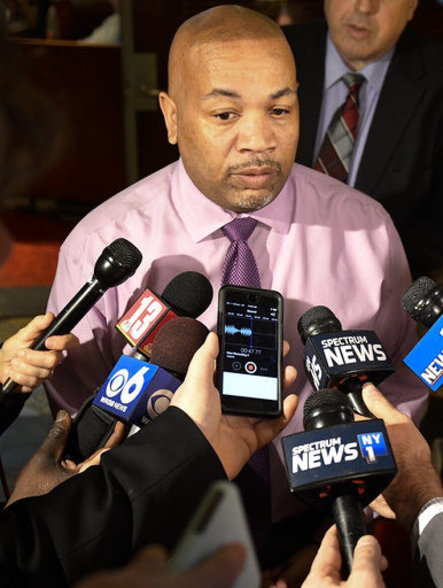 Assembly Speaker Carl Heastie, D-Bronx, speaks to reporters about the state budget at the state Capitol Friday, March 30, 2018, in Albany, N.Y. (AP Photo/Hans Pennink)